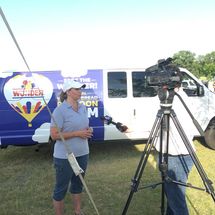 hot air balloon crew being interviewed