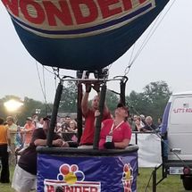  crew next to balloon