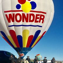  crew next to balloon